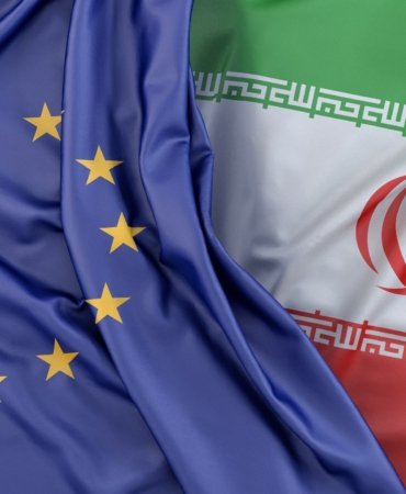 Ruffled Flags of European Union and Iran. 3D Rendering